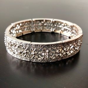 Silver design and studded stretch bracelet